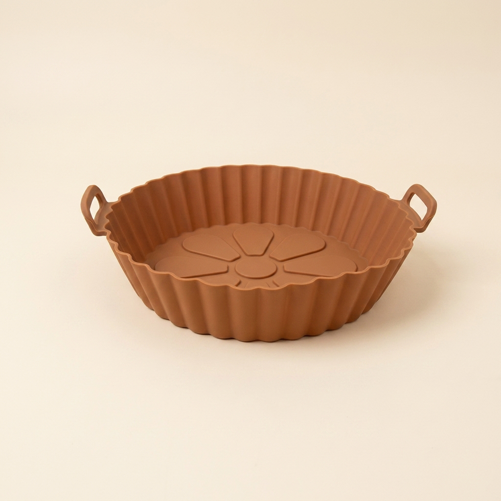 CrispNest silicone air fryer liner in Brown with flower-embossed non-stick base